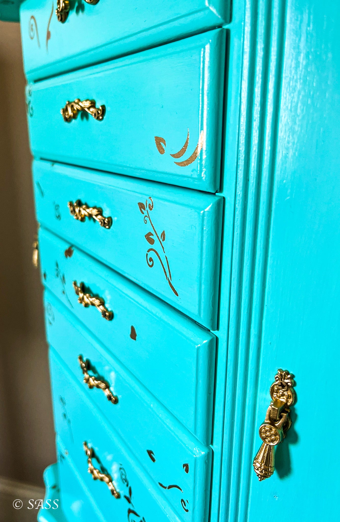 Luxury Jewelry Armoire with Gold Floral Embellishments - La Dauphine Bijouterie